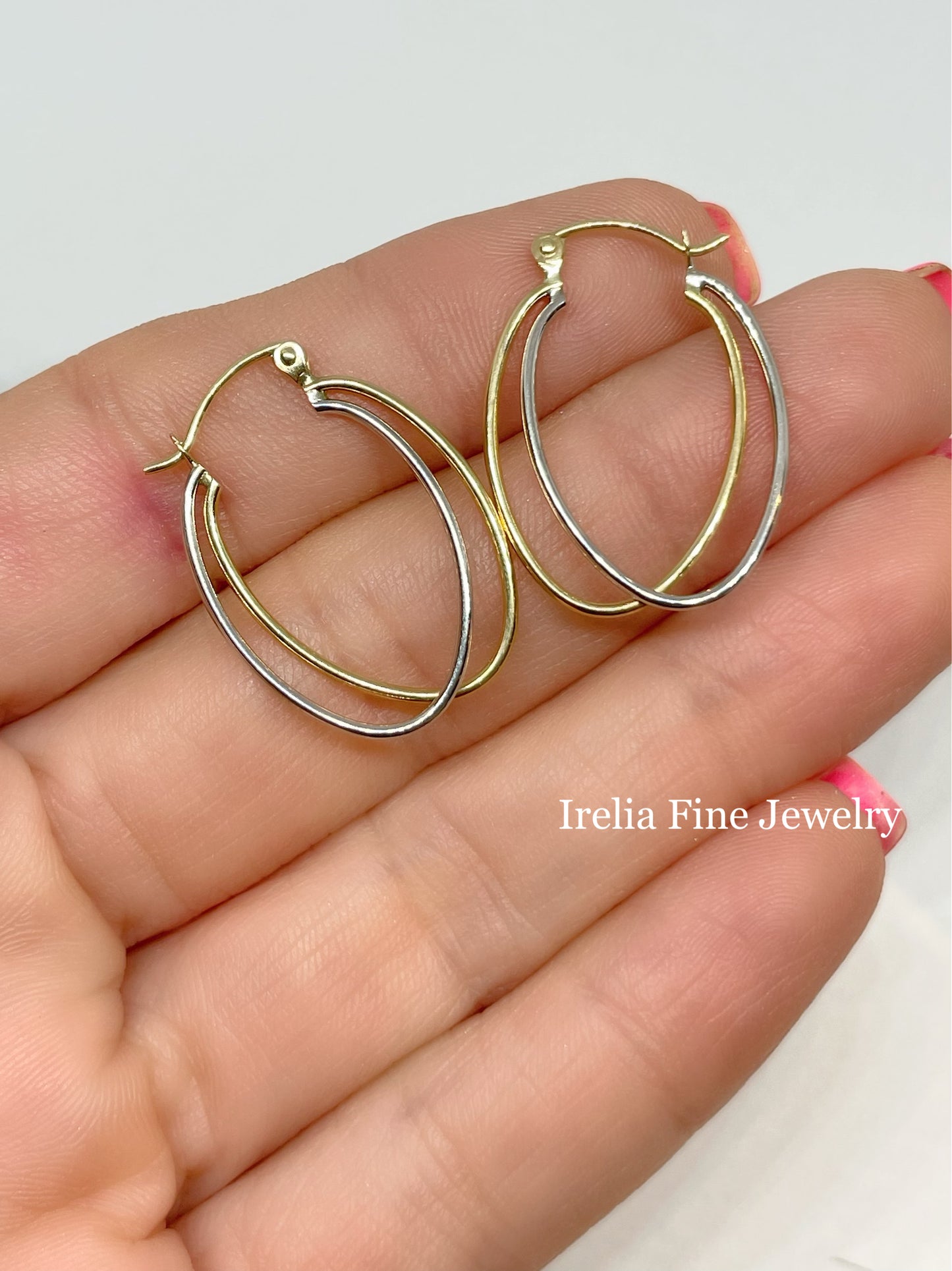14k White and Yellow Gold  overlapping thin oval hoops